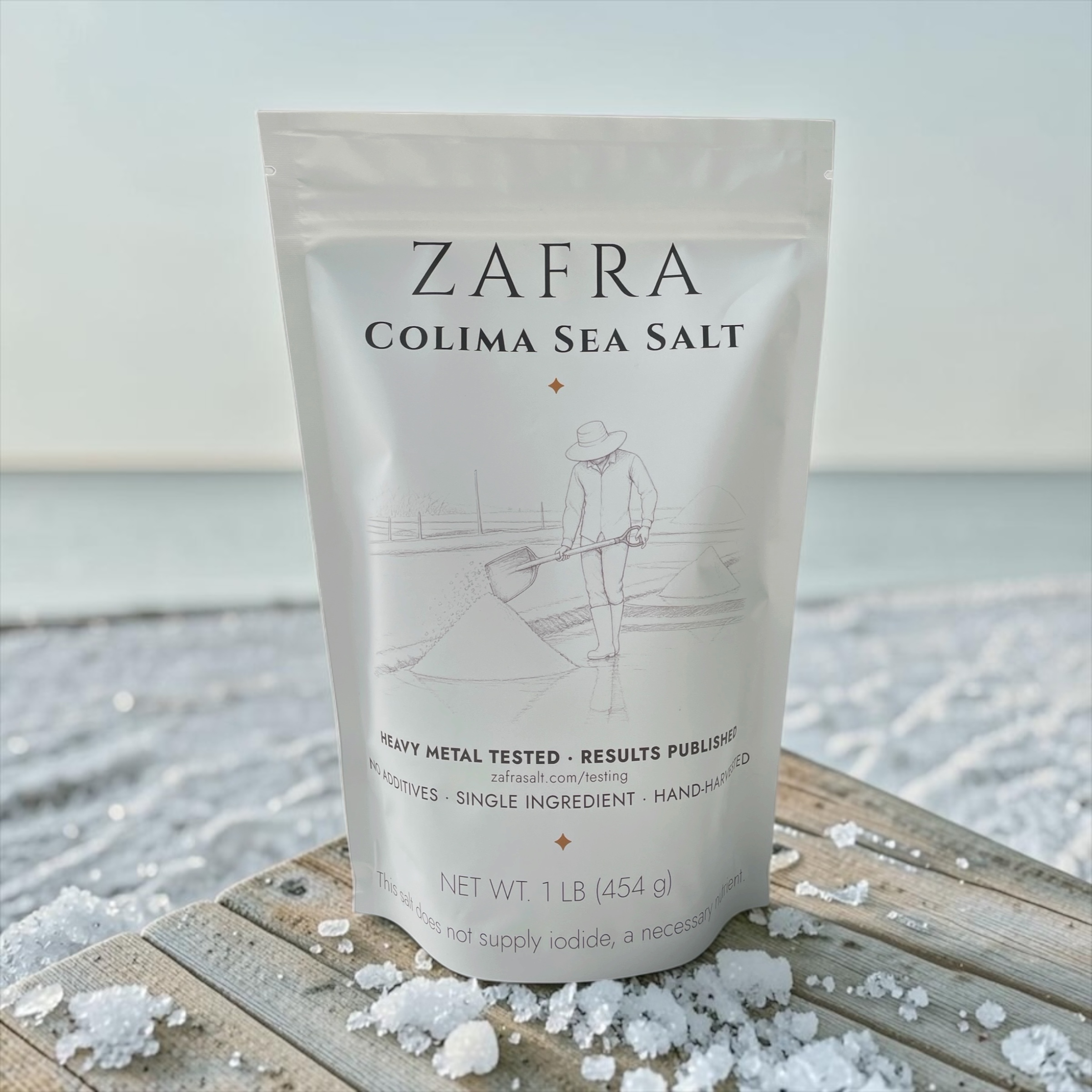 Zafra Colima Sea Salt 16oz pouch on the beach